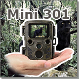 Фотоловушка Suntek Филин Mini301 - в руке